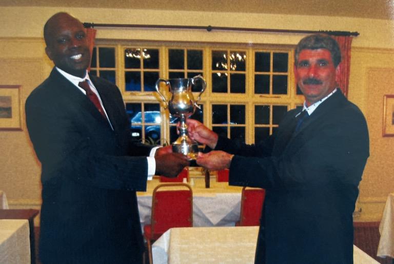 CGS V ACGS - The Victorious ACGA Captain Henry Laville receiving Cup from CGS Captain