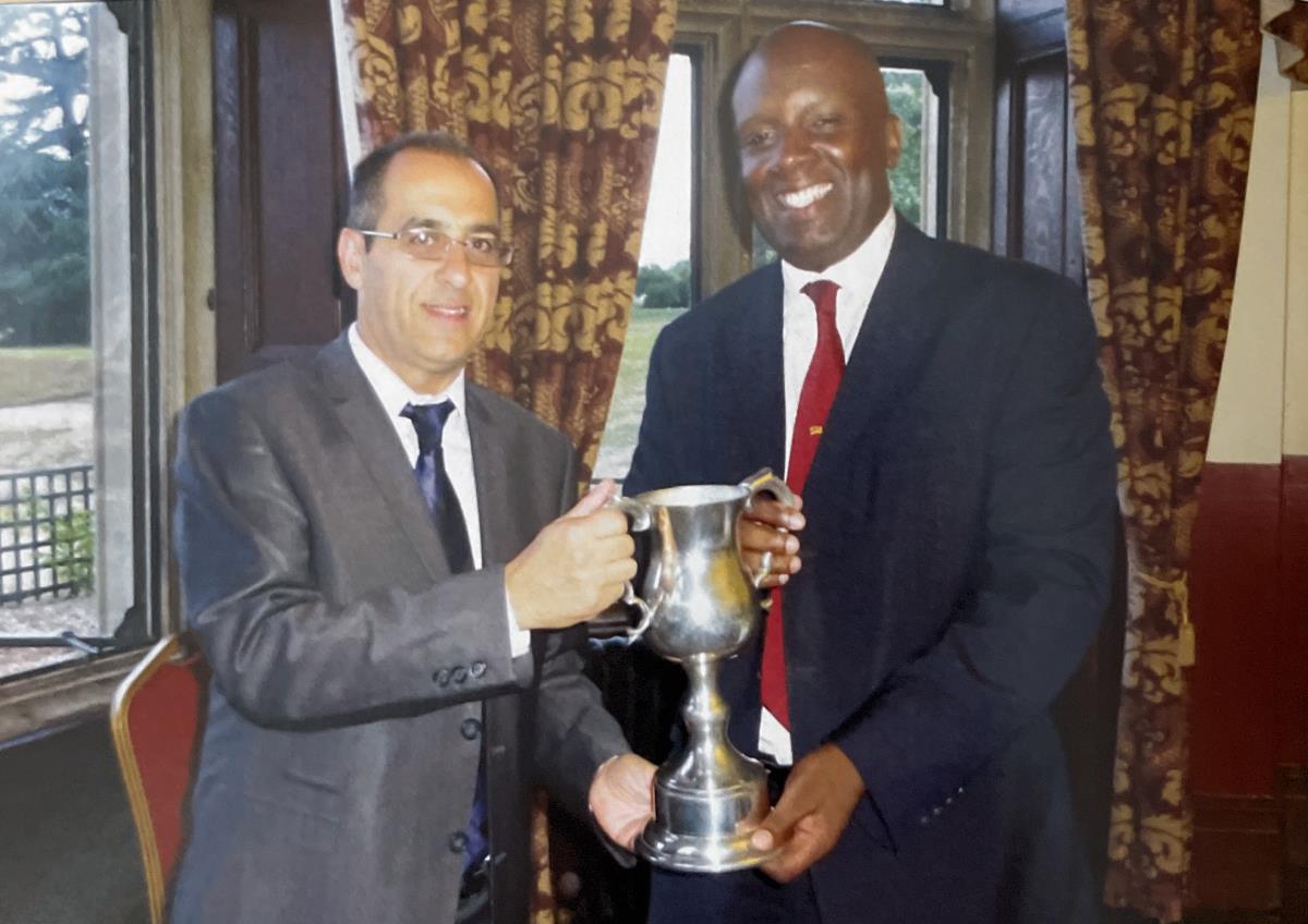 CGS V ACGS - Victorious CGS Captain receiving the cup from ACGA Captain Henry Lavine